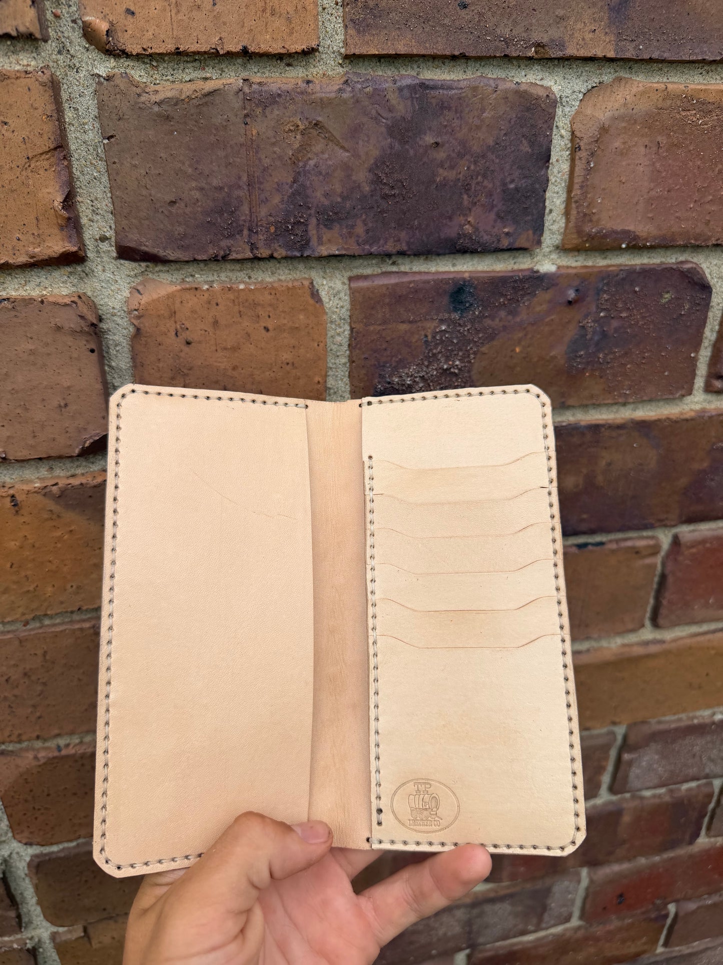 Tan Ostrich Long wallet with Basket Weave corner piece.