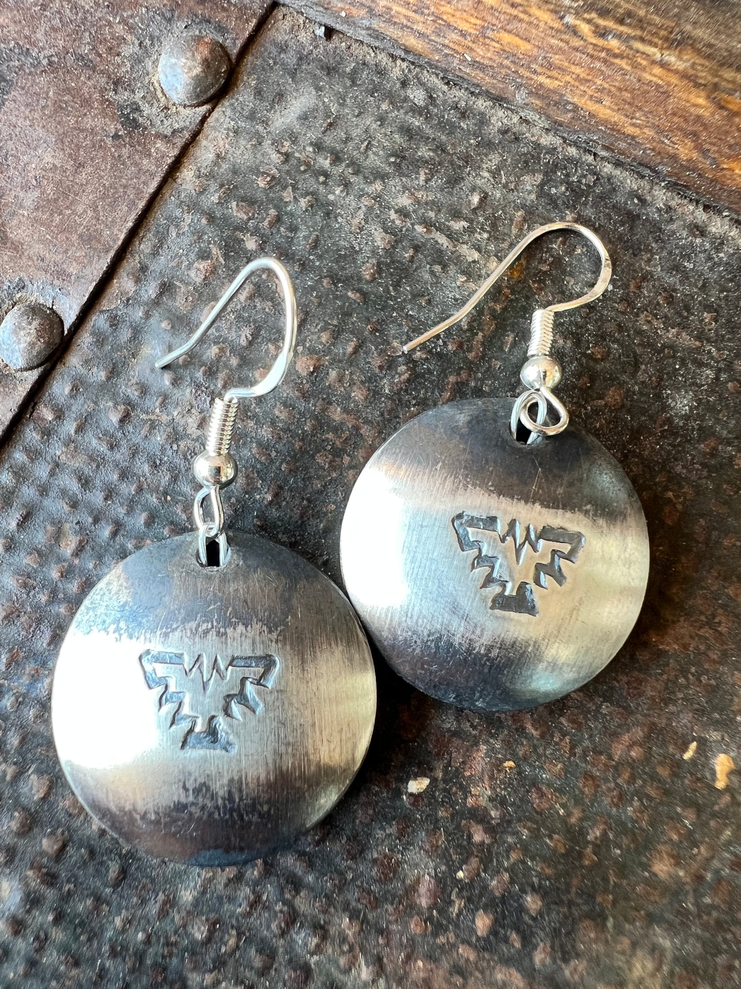 Navajo Handmade by Marietta Kellywood. Sterling Silver Pillow Pearl Thunderbird Stamped Earrings 1.5”