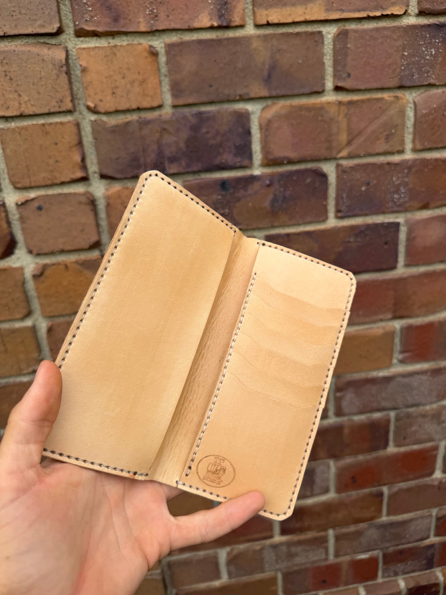 Diamondback Rattlesnake long wallet with basket weave tooling.