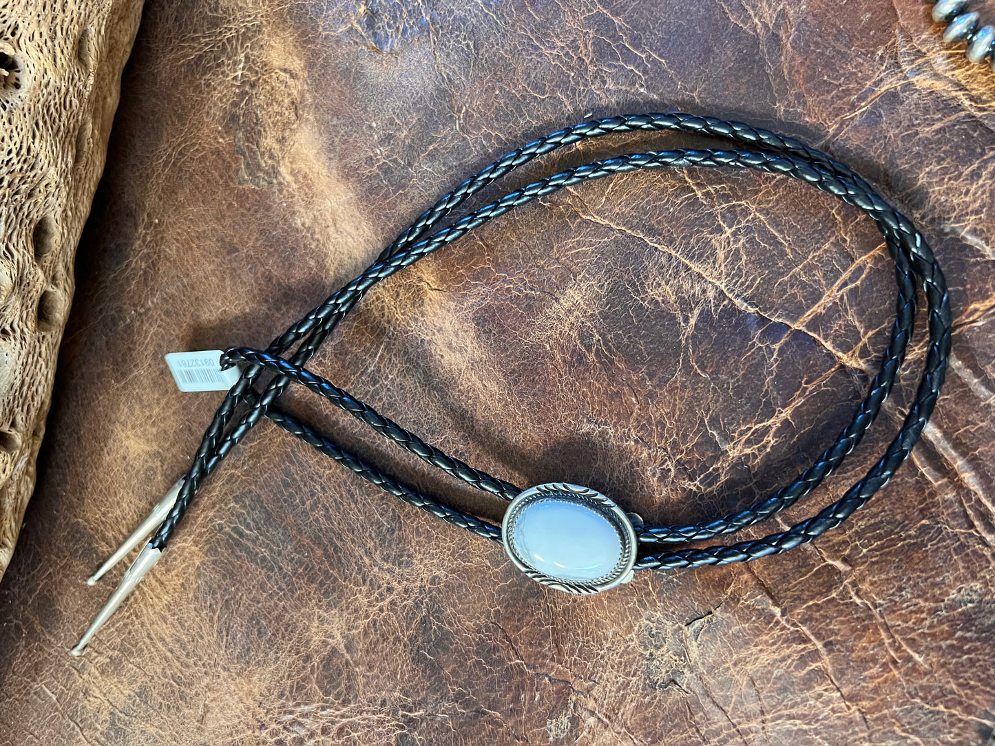 Handmade White Buffalo and Sterling with Black Braided Leather Bolo Necklace with Sterling Tips